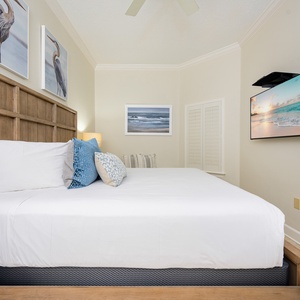 Relax on the cozy king bed in this guest suite and stream your favorite shows after a beach day