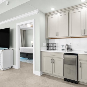 Grab a chilled drink from the fridge or create your favorite cocktail at the wet bar