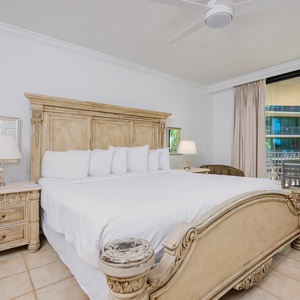 Experience peaceful mornings in the master bedroom, with plush king bedding and stunning balcony views