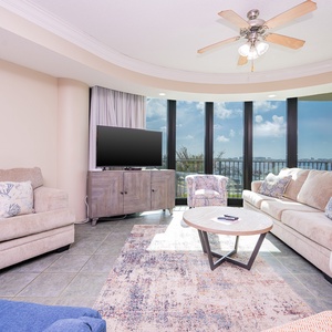 Unwind in comfort on plush seating while soaking in breathtaking views through expansive windows