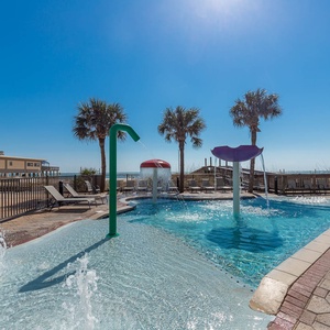 Splash in the fun pool with the little ones featuring playful water features and a gradual entry, just steps from the beach