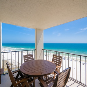 Waves roll onto the shore as you relax on your balcony with a cool drink or beach snacks