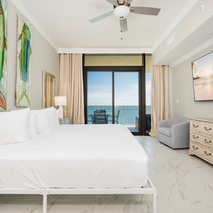 Relax in the master bedroom featuring a king bed and the sights and sounds of the gulf coast