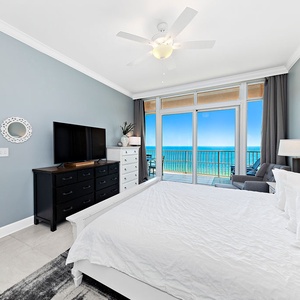 Breathe coastal air through open sliding doors while relaxing in the king master suite