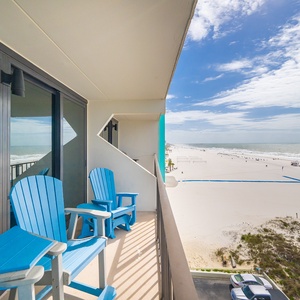 Relax in your bright chairs on your balcony, enjoying breathtaking beach views and the soothing coastal vibe