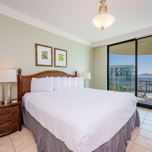 Rest peacefully in the king master suite with soft bedding and drift off to the sights and sounds of the bay