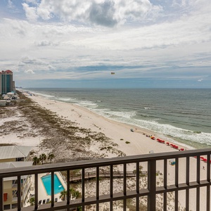 Enjoy stunning beach views from this balcony, perfect for relaxing and soaking in the coastal atmosphere