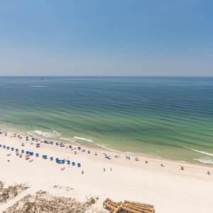 Step onto the balcony and breathe gulf air as colorful umbrellas dot the shore and waves ripple to the beach