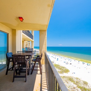 Poly-wood table with high chairs offers a perfect spot to enjoy the sweeping views of the beach and sparkling water