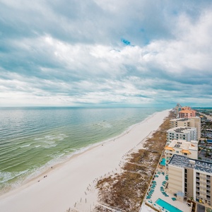 Experience seemingly endless coastline views of the horizon as waves lap the shore and the sun glistens over the water