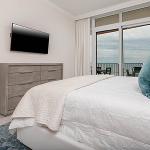 Unwind on the king bed in the master, stream shows on the wall TV, then step onto the gulf-facing balcony