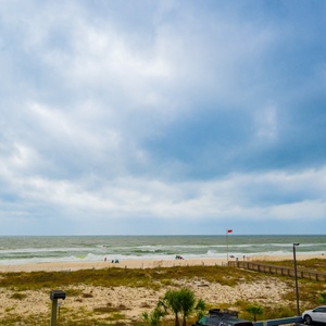 Enjoy stunning beachfront views and a relaxing atmosphere from this inviting space, perfect for unwinding after a day of fun