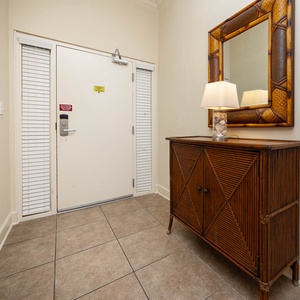 Step into this welcoming entryway, where the charming decor invites you to start your beach getaway in style