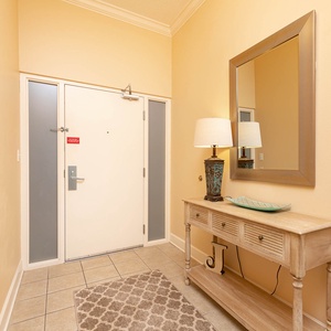 Step into a warm welcome with a stylish entryway that invites you to begin your beach getaway