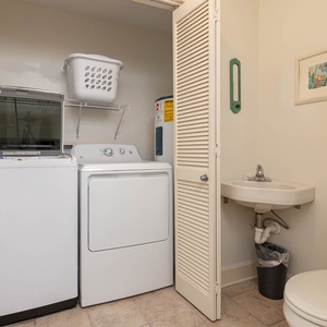 Enjoy the convenience of an in-unit laundry area with a washer, dryer, and half bath for your comfort and ease