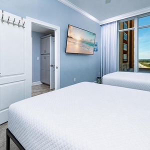 Unwind in this queen guest suite and stream your favorite shows or enjoy a good movie after a beach day