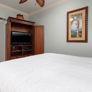 Relax on the cozy queen bed in this guest suite and stream your favorite shows after a fun vacation day
