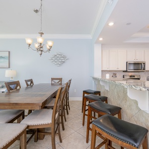 Wake up with morning coffee at the breakfast bar and get ready for a beach day in this stylish space
