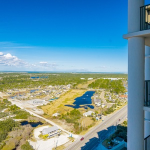 Experience peaceful moments from your balcony, soaking in expansive views of the lush landscape and sparkling waters