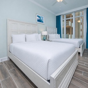 Relax in one of the queen beds in the guest suite surrounded by fluffy pillows for a peaceful retreat