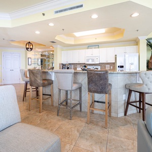 Enjoy casual meals at the stylish breakfast bar, surrounded by vibrant decor and a welcoming atmosphere