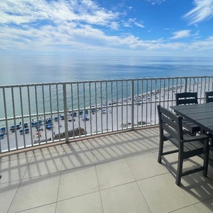 Imagine sitting at the outdoor table as warm sun kisses your skin and the gulf stretches out to the horizon