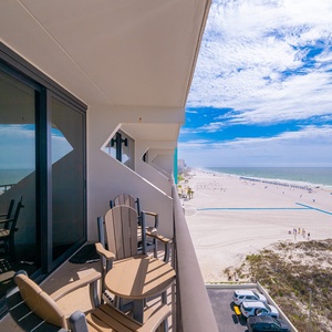 Enjoy the coastal vibe from your balcony, watching the vibrant beach life unfold below you