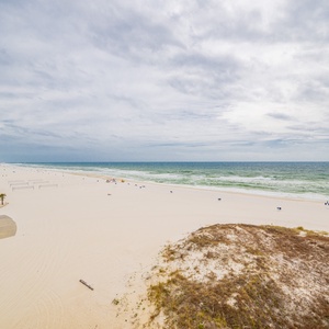 Enjoy refreshing beachfront views from this inviting space, perfect for relaxation and unwinding by the shore