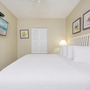 Relax after a fun day at the beach in this guest suite with a king bed
