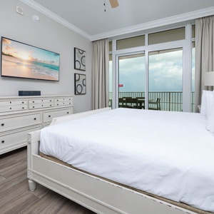 Drift into relaxation in this king master suite, complemented by gentle coastal breezes flowing from the balcony