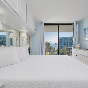 Enjoy the beach vibe while gazing at the inviting lagoon view from your master suite