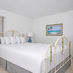 Relax in the soft queen bed in the guest room while enjoying your favorite shows on the TV