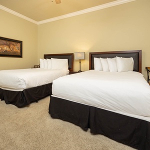 Relax on one of the cozy queen beds in this guest suite and enjoy a peaceful slumber