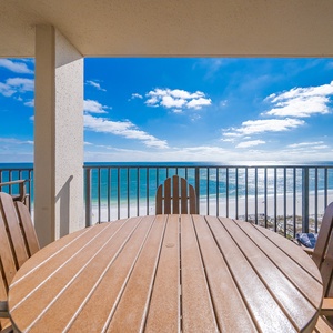 Enjoy meals or drinks while taking in the expansive views of the shimmering water and blue skies