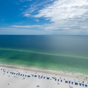 Watch the coastline stretch into the distance and the horizon meet the sky from your balcony while you soak up the sun
