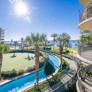 Discover the pool area with a refreshing lazy river and thrilling waterslide, just steps from the bay