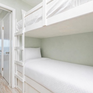 This cozy bunk area is perfect for kids to relax after beach adventures