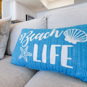 A vibrant blue pillow with 