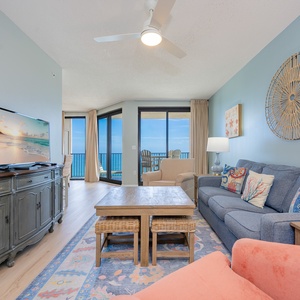 Colorful pillows brighten the living room where you relax and enjoy stunning gulf views from your balcony
