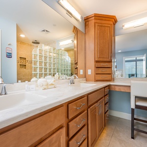 Indulge in relaxation in this elegant master bath with a refreshing walk-in shower and stunning upgrades