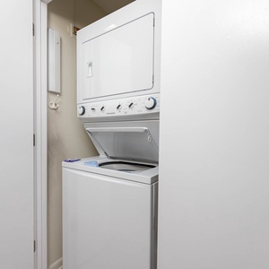 Washer and dryer combination tucked neatly in a closet, providing convenient laundry options during your stay