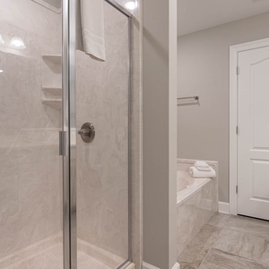 Enjoy a refreshing shower in the master bath or soak in the soothing jetted tub after a day at the beach