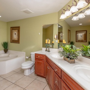 Refresh in the master bath after a day of adventure with a soothing jetted tub and relaxing walk-in shower