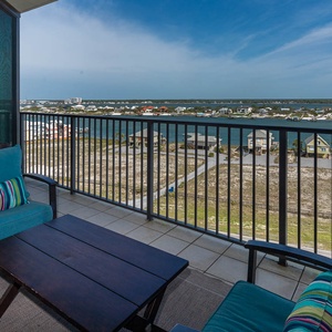 Enjoy tranquil views of the water and surrounding landscape from the balcony