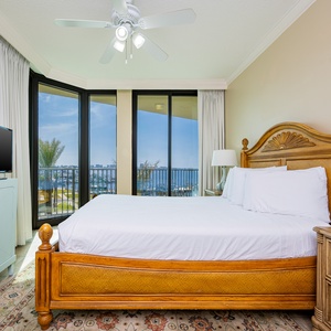 Wake to a breathtaking view in this queen guest suite with expansive views from the balcony