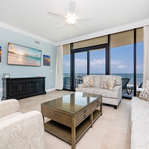 Comfortable living area with plush seating and stunning coastal views