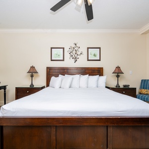 Unwind after a fun vacation day and stream your favorite shows in the king master suite with balcony access