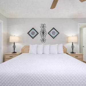 Drift into comfort on the plush king bed in the master, enveloped by soft linens and soothing decor, as you unwind