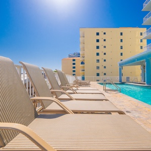 Relax poolside in the comfortable loungers while soaking up the sunshine