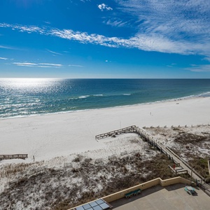 Experience stunning views of the pristine beach from your private balcony, perfect for relaxation and unwinding